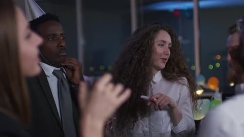 Friends Dancing at Corporate Party in Office