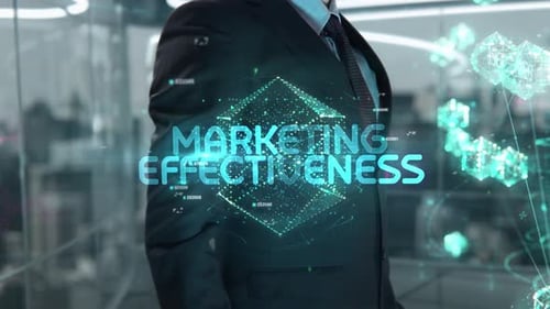 Businessman with Marketing Effectiveness Hologram Concept