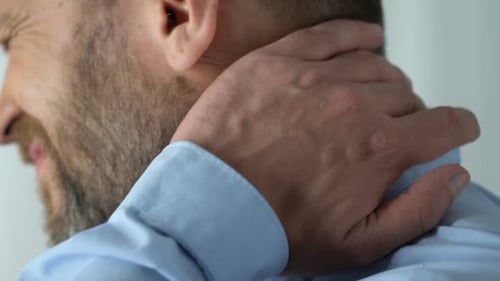 Male Touching Neck, Feeling Strong Spasm Upper Back, Pinched Nerve, Discomfort