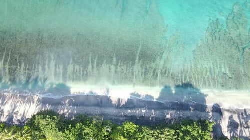 Overhead View of White Sand Beach and Turquoise Water