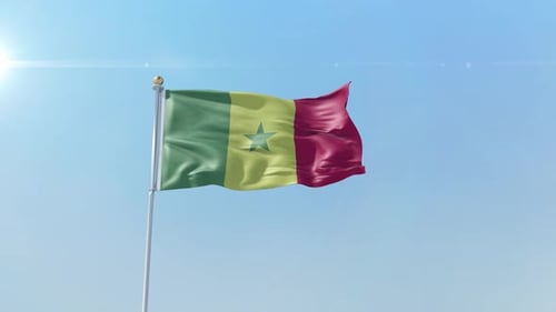 Realistic Waving Flag of Senegal against Blue Sky
