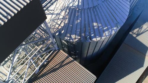 Farming elevator and granary. Storage of grain and other different cereals. Aerial view