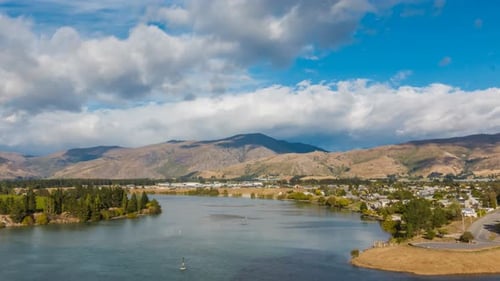 Timelapse of rainbow above river
