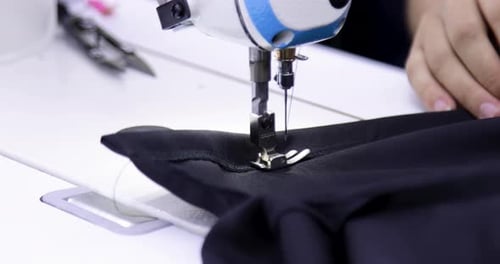 Sewing Machine Stitching Blue Fabric Close Up
