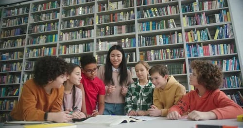 Asian Teacher and Children Rejoice After Completing Project