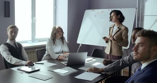 Confident Woman Leading Corporate Presentation