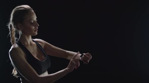 Athletic Woman Using Futuristic Fitness Technology