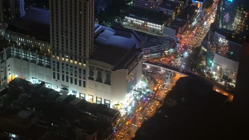 Night Traffic on A City Street. Skyscrapers and Financial Centers. Urban