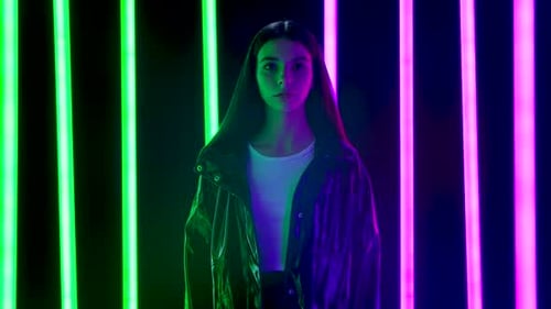Stylish Woman Posing with Colorful Neon Lights