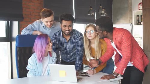 Multi-Ethnic Group of People Working Together Indoors