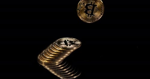 Bitcoin Cryptocurrency Coins Stacked Reflecting on Black