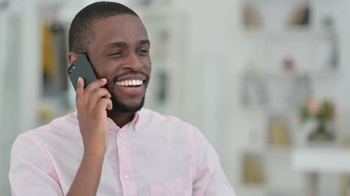 Man Talking on Cell Phone, Close Up, Indoors