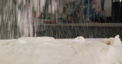 Cooking the Dough is Sprinkled with Flour