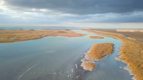 Aerial View of River and Frozen Landscape