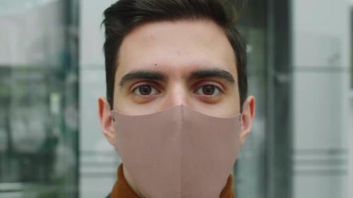 Young Adult Wearing Face Mask Close Up