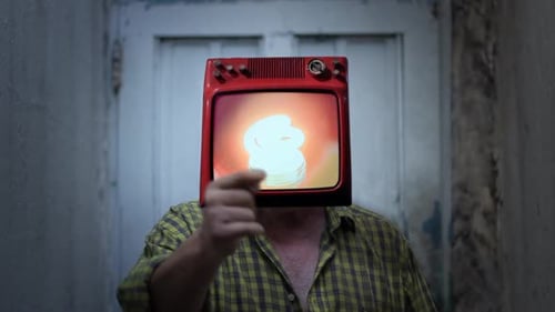 Person with Television Head Showing Fluorescent Bulb