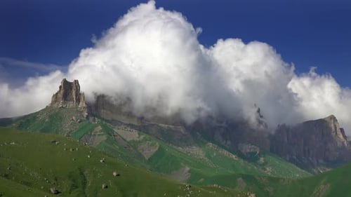 Dramatic Clouds Enveloping Rocky Mountain Peaks
