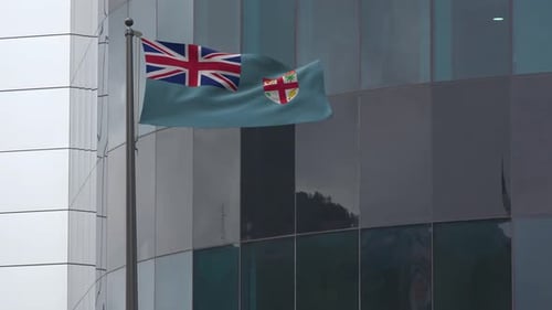 Realistic Fiji Flag Waving on Modern Corporate Building