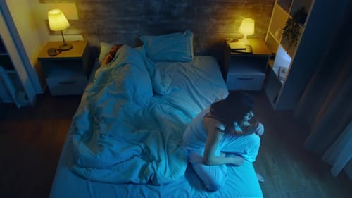 Top View of Young Woman Suffering From Insomnia