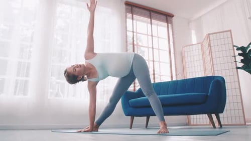 Pregnant Woman Does Yoga at Home