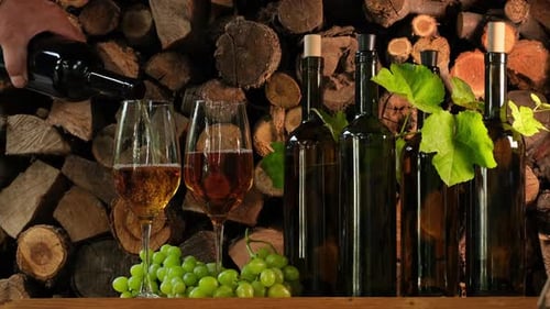 Grape harvest. Wine tasting culture. Sommelier pouring white dessert wine in glass
