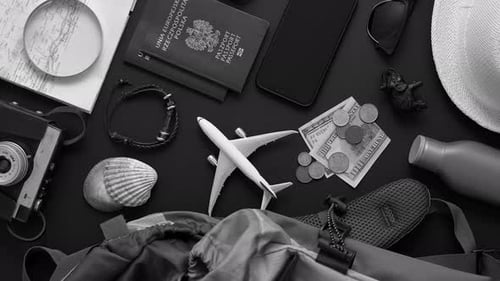 Travel and Tourist Concept. Vacation and Travel Accessories Placed on Black Background.