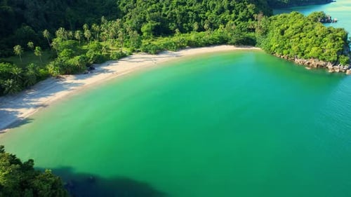 An aerial view of the unique turquoise waters and beautiful mountain coast