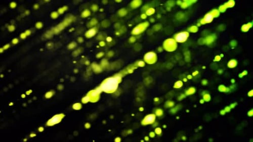 Green shining rays of small dots and circles