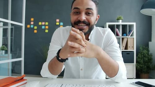 Young Adult Communicating in Modern Office Setting