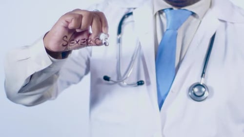 Doctor Writes On Transparent Glass Sexercise