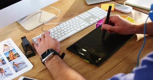 Graphic designer using graphics tablet