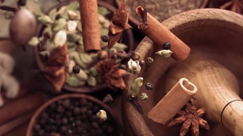 Spices Falling in Bowls and Mortar