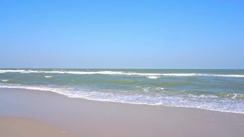 Beautiful tropical beach sea ocean with blue sky and white cloud