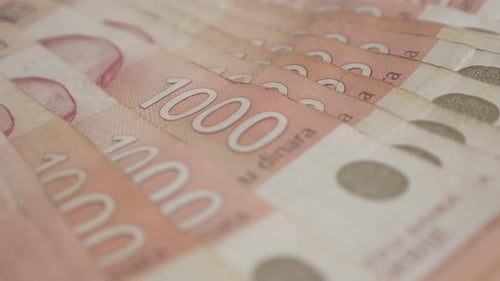 Wad of Serbian banknotes close-up slow tilt 4K 2160p 30fps UltraHD footage - Paper denominations