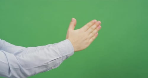 Side view of hands begging
