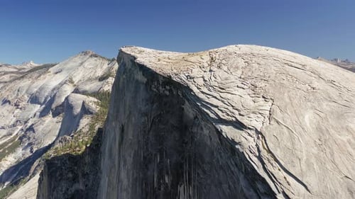 Half Dome Mountain Aerial Survey in Sunny Weather. Yosemite National Park, California, USA