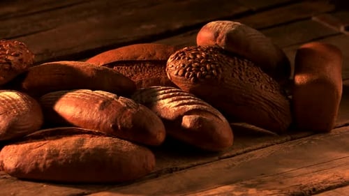 Artisan Breads on Wooden Surface