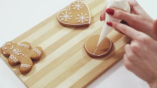 Close Up of Tasty Brown Cookies That Glazing Female Baker