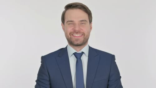 Smiling Man in a Suit and Tie