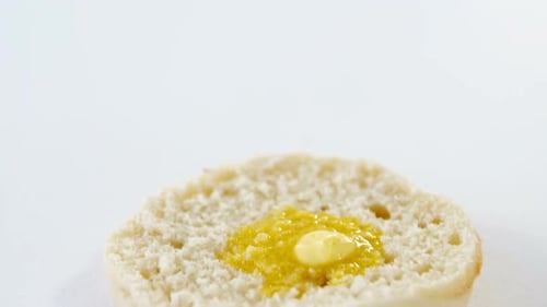 Bread Slice with Butter and Yellowish Spread