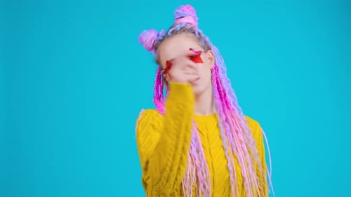 Woman Models Star Glasses with Colorful Braids