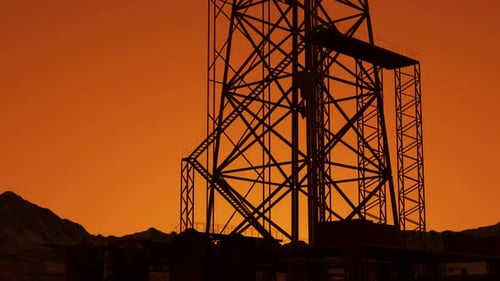 A big drill rig on the oil field. A rig is used in the petrochemical industry.