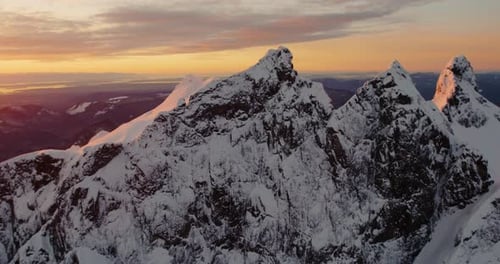 Amazing Nature Brilliant Luminous Orange Light Three Fingers Mountain Peak With Snow Seascape