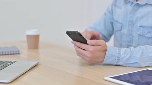 Hands of Man Using Smartphone, Close Up