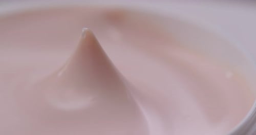 Close Up of Smooth Light Pink Cream