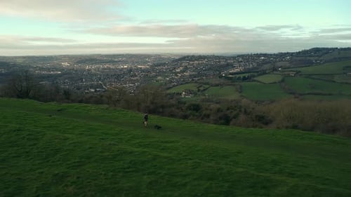 Aerial Drone Countryside Runner With Dog Sunrise Sunset Hilltop View