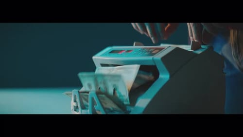 Money Counting Machine Quickly Counts Dollar Bills