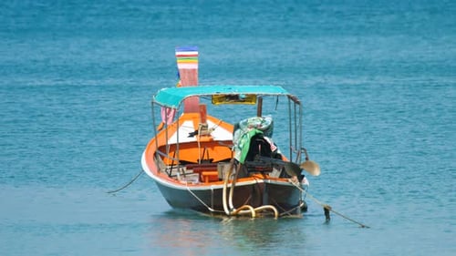 Longtail Motorboat Near Beach