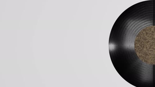 Playing music from a vinyl record.