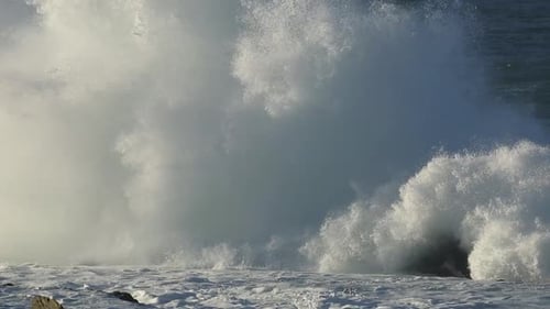 Waves Crashing Against Rocks on the Ocean Coast